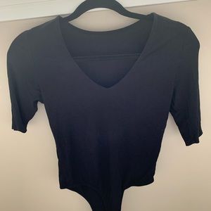 Black low neck short sleeve bodysuit